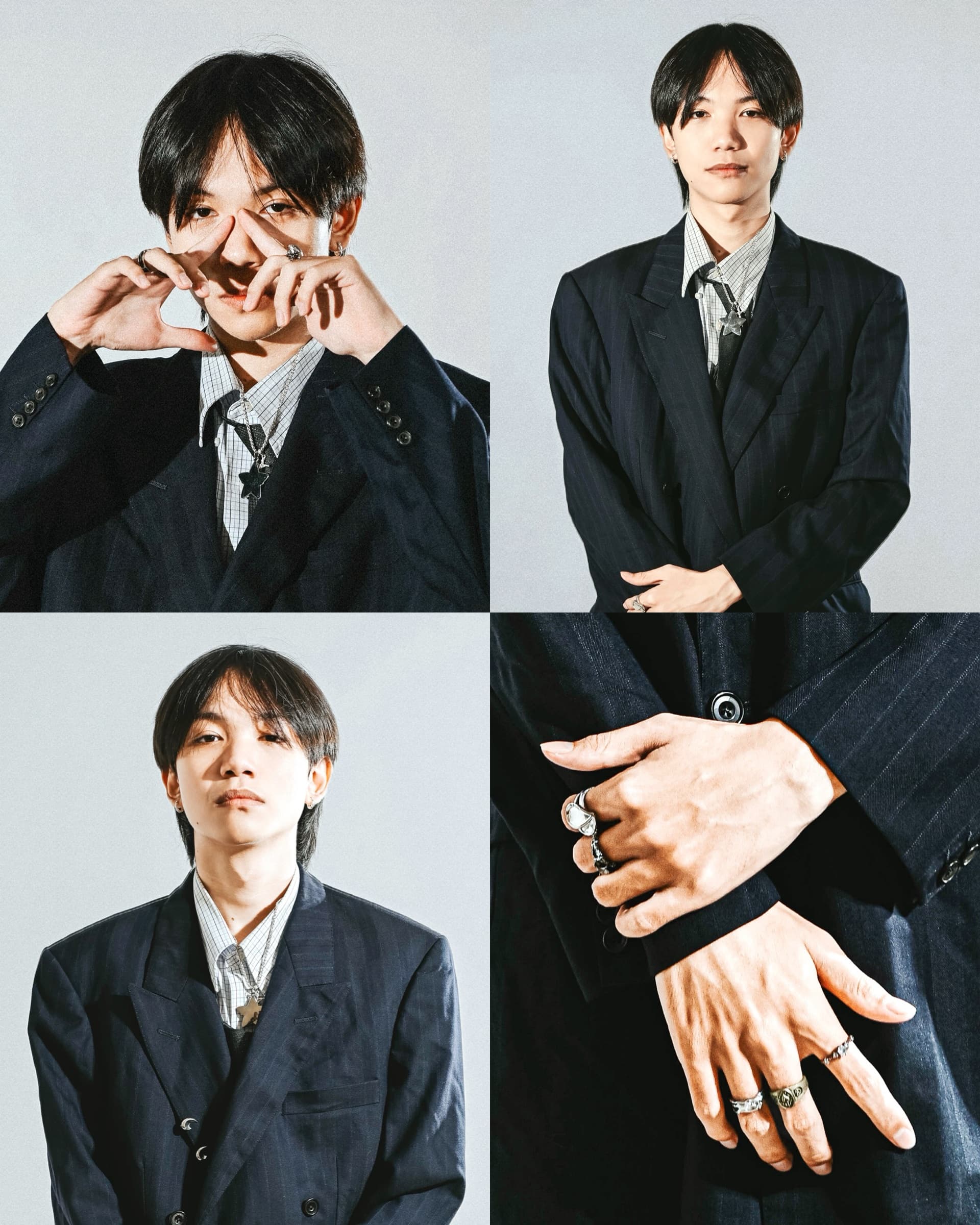 Fashion portrait in a dark tailored suit