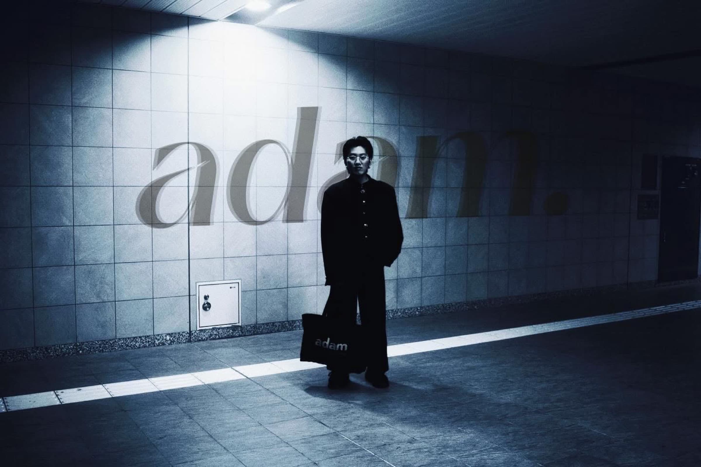 Blue-toned fashion portrait in an underground passage